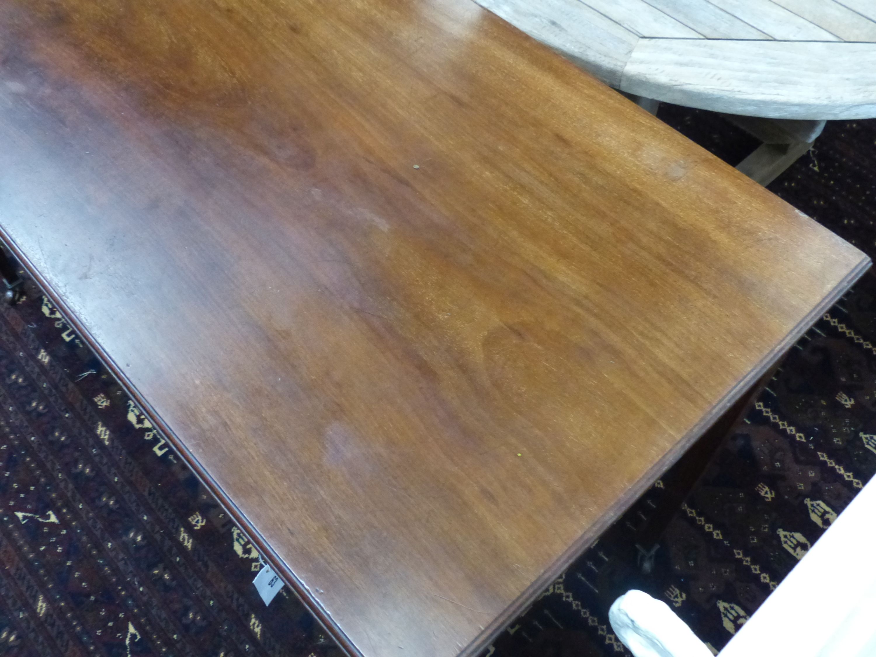 An Edwardian satinwood banded mahogany two drawer side table, width 122cm, depth 54cm, height 76cm